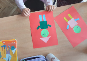 Wykonanie wspólnej pracy plastycznej ,,Geometryczny pajacyk"